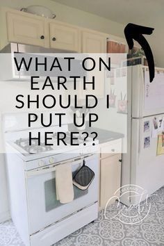 an image of a kitchen with the words what on earth should i put up here?